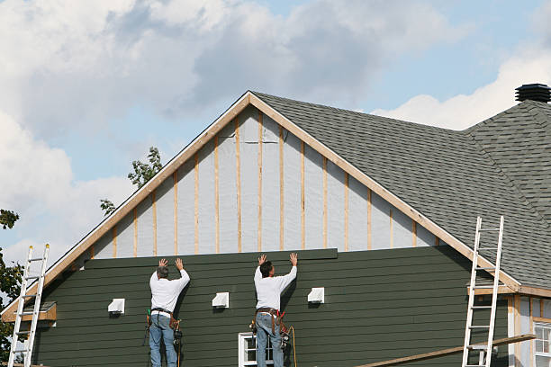 Professional Siding Replacement technician working in Campbell, OH